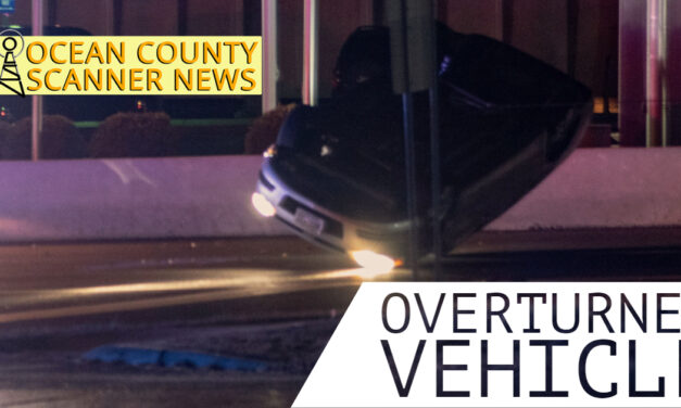 POINT PLEASANT:  MOTOR VEHICLE ACCIDENT WITH OVERTURNED CAR HANGING ON GUARDRAIL ON BRIDGE